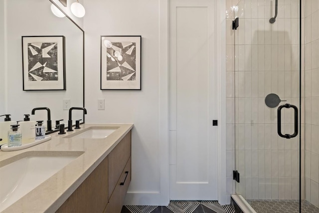 4907 Delores Ave, Austin, TX 78721 - bathroom featuring double vanity and a stall shower