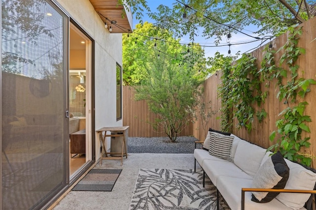 4907 Delores Ave, Austin, TX 78721 - fenced backyard featuring an outdoor hangout area and a patio