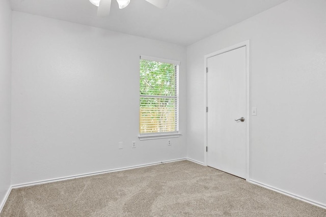8608 Dittmar Oaks Dr, Austin, TX 78748 - spare room featuring carpet floors, a ceiling fan, and baseboards