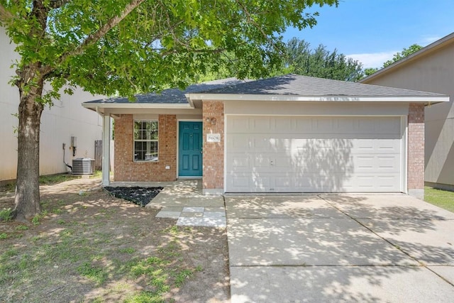 8608 Dittmar Oaks Dr, Austin, TX 78748 - ranch-style home featuring brick siding, a garage, concrete driveway, and a shingled roof