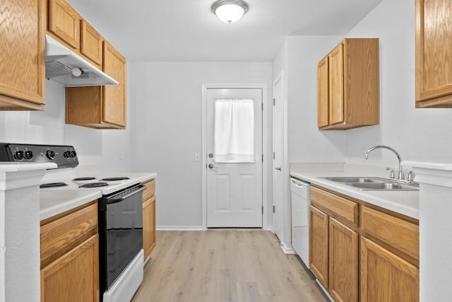 8608 Dittmar Oaks Dr, Austin, TX 78748 - kitchen with electric range oven, a sink, under cabinet range hood, dishwasher, and light wood-style flooring