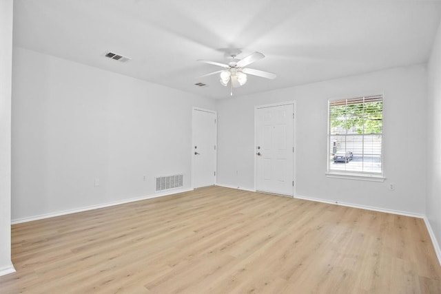 8608 Dittmar Oaks Dr, Austin, TX 78748 - spare room featuring light wood-type flooring, baseboards, and a ceiling fan