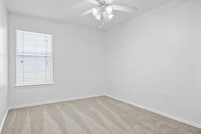 8608 Dittmar Oaks Dr, Austin, TX 78748 - spare room featuring carpet floors, a ceiling fan, and baseboards