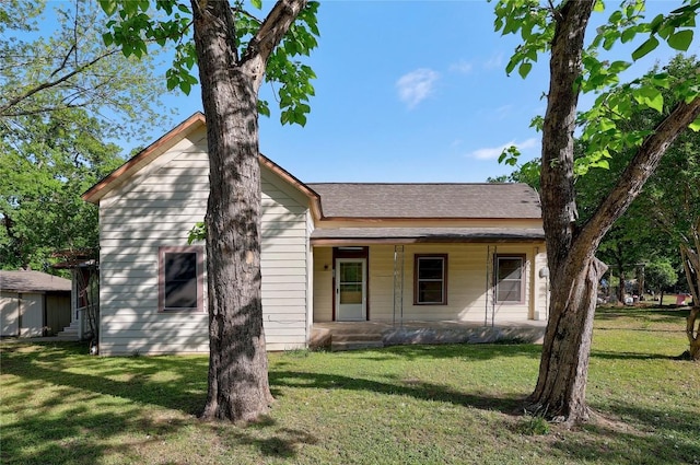 300 W Cleveland St, Elgin, TX 78621 - view of front of home featuring a front yard and covered porch
