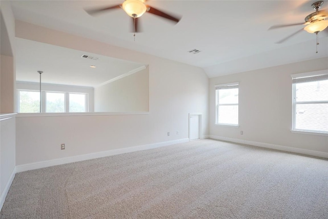 11721 Quintana Cv, Austin, TX 78739 - spare room featuring a ceiling fan, baseboards, carpet, and lofted ceiling