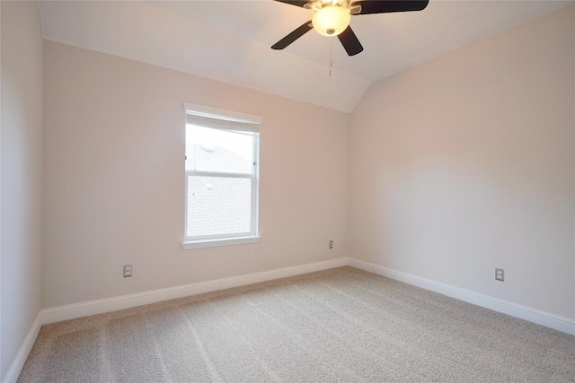 11721 Quintana Cv, Austin, TX 78739 - empty room with ceiling fan, light carpet, lofted ceiling, and baseboards