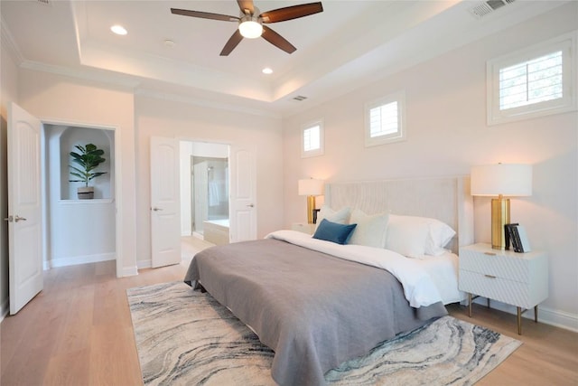 11721 Quintana Cv, Austin, TX 78739 - bedroom with a raised ceiling, light wood-style flooring, baseboards, recessed lighting, and ornamental molding