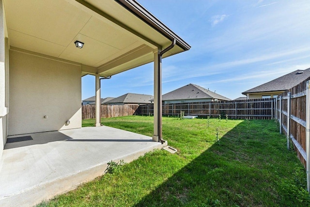 view of yard featuring a fenced backyard and a patio