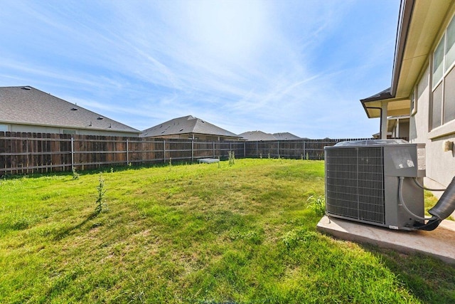 view of yard featuring cooling unit and a fenced backyard