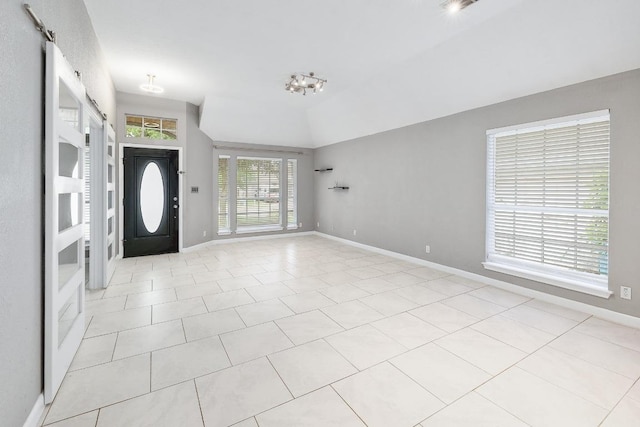 2616 Glenwood Trl, Cedar Park, TX 78613 - entrance foyer featuring baseboards, light tile patterned floors, and vaulted ceiling