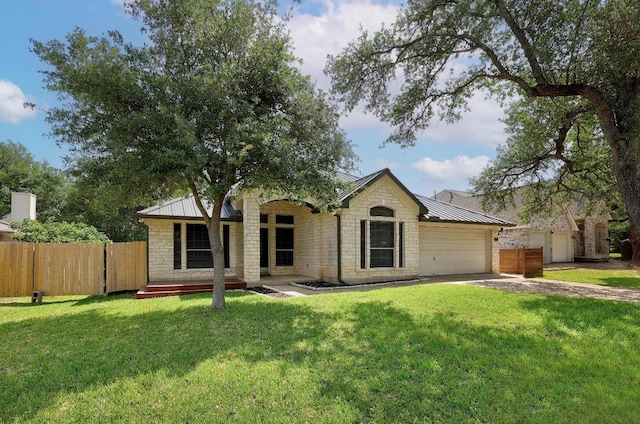 2616 Glenwood Trl, Cedar Park, TX 78613 - ranch-style house featuring an attached garage, concrete driveway, stone siding, metal roof, and covered porch