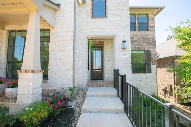 18705 Alonso Pl, Austin, TX 78738 - view of exterior entry featuring stone siding