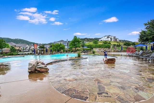 18705 Alonso Pl, Austin, TX 78738 - community pool with a patio area