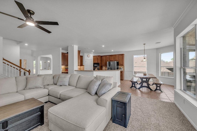 1107 Shiloh St, Cedar Park, TX 78613 - living area featuring a ceiling fan, baseboards, light tile patterned floors, stairs, and recessed lighting
