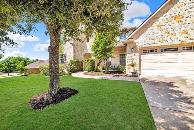 1107 Shiloh St, Cedar Park, TX 78613 - view of front of house with stone siding, driveway, a front yard, and a garage