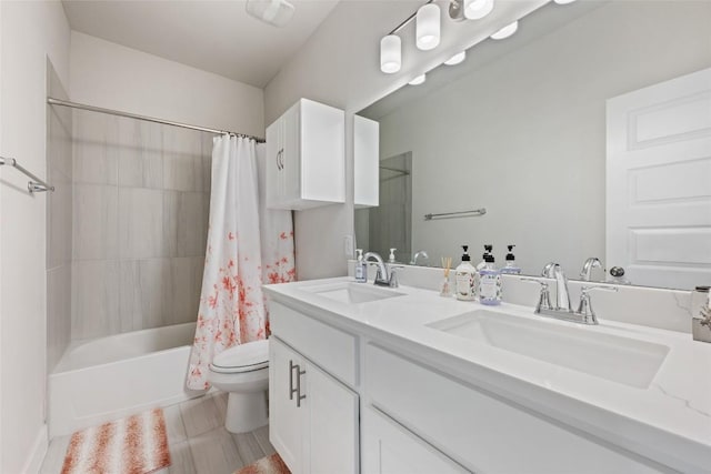 full bath with toilet, shower / tub combo with curtain, double vanity, and tile patterned flooring
