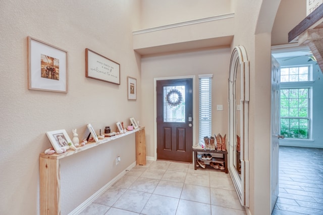5917 Moriano Cv, Round Rock, TX 78665 - entrance foyer featuring arched walkways and light tile patterned floors