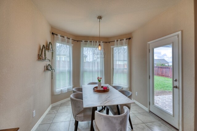 5917 Moriano Cv, Round Rock, TX 78665 - dining area featuring light tile patterned flooring