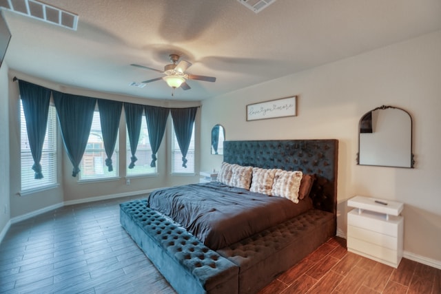 5917 Moriano Cv, Round Rock, TX 78665 - bedroom with wood finish floors and a ceiling fan