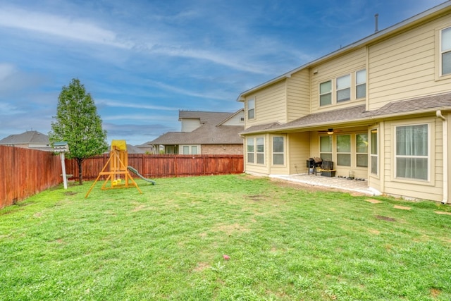 5917 Moriano Cv, Round Rock, TX 78665 - view of yard featuring ceiling fan, a playground, and a patio