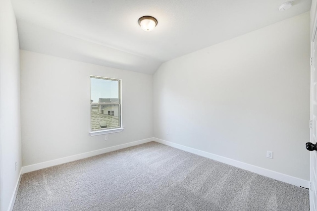 300 Echo Pass, Liberty Hill, TX 78642 - carpeted spare room with a smoke detector and lofted ceiling