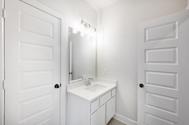300 Echo Pass, Liberty Hill, TX 78642 - bathroom featuring vanity and baseboards