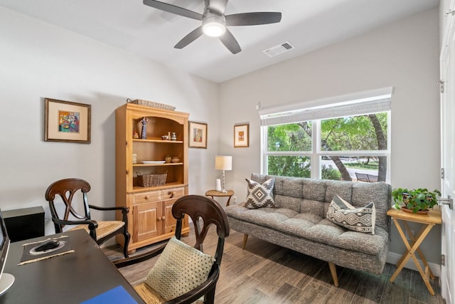 office with visible vents, a ceiling fan, and wood finished floors