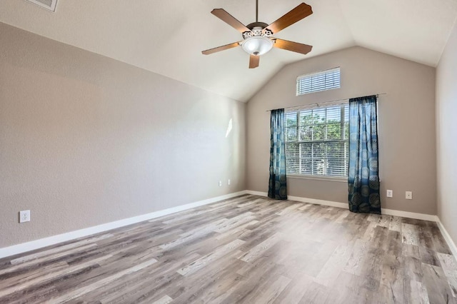 2632 Century Park Blvd Unit 3, Austin, TX 78727 - empty room with baseboards, a ceiling fan, wood finished floors, and lofted ceiling