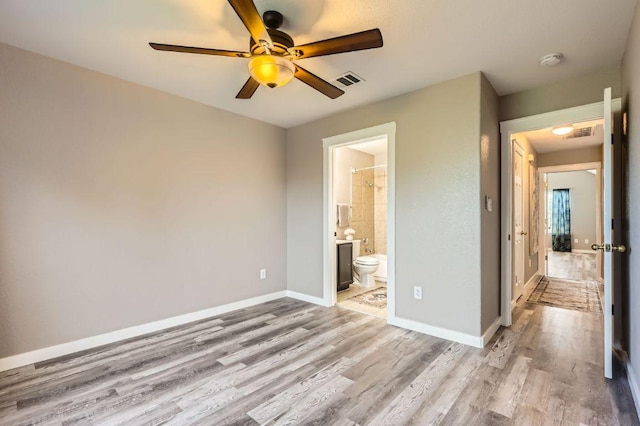 2632 Century Park Blvd Unit 3, Austin, TX 78727 - unfurnished bedroom featuring light wood-style flooring, baseboards, visible vents, and ensuite bath
