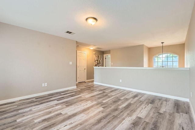 2632 Century Park Blvd Unit 3, Austin, TX 78727 - spare room with visible vents, light wood-type flooring, and baseboards