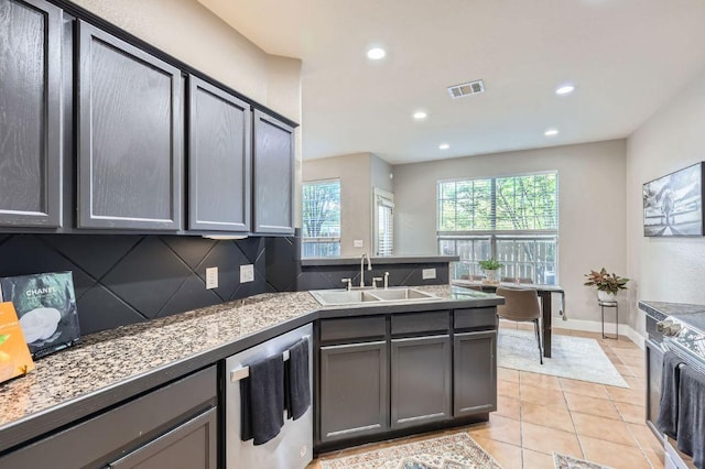 2632 Century Park Blvd Unit 3, Austin, TX 78727 - kitchen with recessed lighting, a peninsula, visible vents, stainless steel dishwasher, and a sink