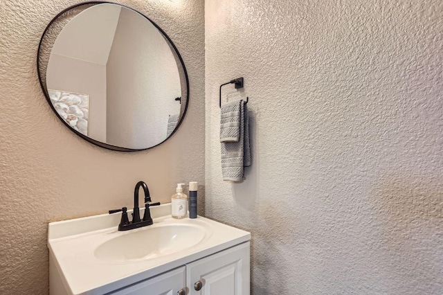 2632 Century Park Blvd Unit 3, Austin, TX 78727 - bathroom with a textured wall and vanity