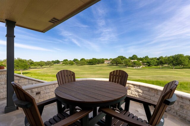 108 Chuckwagon Trl, Georgetown, TX 78633 - view of patio featuring golf course view and outdoor dining space