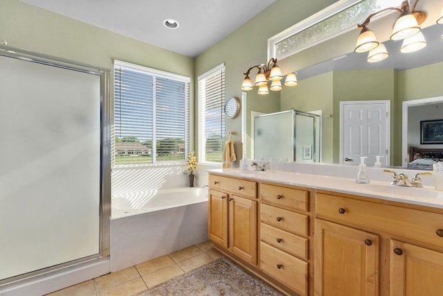 108 Chuckwagon Trl, Georgetown, TX 78633 - full bathroom featuring a chandelier, a shower stall, double vanity, a garden tub, and tile patterned floors