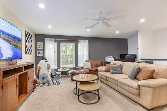 living area featuring recessed lighting, light carpet, a ceiling fan, and an office area