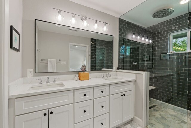 5911 W Gate Blvd, Austin, TX 78745 - bathroom featuring walk in shower and double vanity