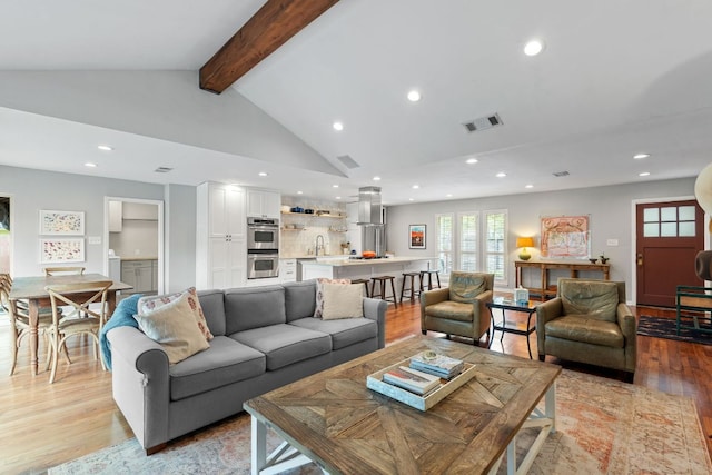 5911 W Gate Blvd, Austin, TX 78745 - living room with light wood-style flooring and recessed lighting