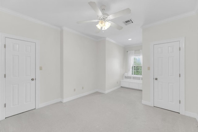 unfurnished bedroom with visible vents, baseboards, crown molding, recessed lighting, and light colored carpet