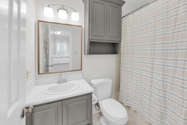 full bath featuring vanity and toilet