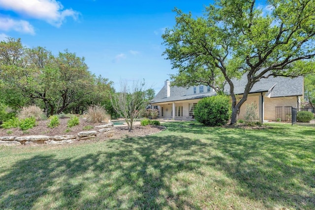 view of yard with fence