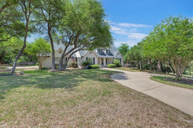 view of front of house with a front lawn