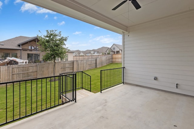 220 Washington Dr, Kyle, TX 78640 - view of patio / terrace featuring ceiling fan and a residential view