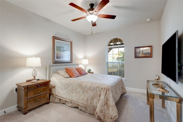 262 Singing Sumac Way, San Marcos, TX 78666 - bedroom with light colored carpet and ceiling fan