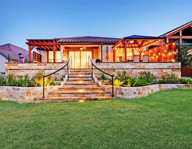 262 Singing Sumac Way, San Marcos, TX 78666 - view of front facade featuring a front yard, a tile roof, and stucco siding