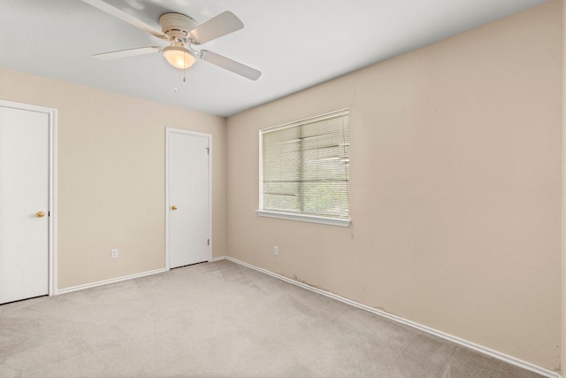 141 Sydneys Way, Buda, TX 78610 - unfurnished bedroom featuring carpet flooring and a ceiling fan