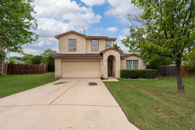 141 Sydneys Way, Buda, TX 78610 - traditional-style house with stone siding, an attached garage, and driveway