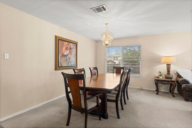 141 Sydneys Way, Buda, TX 78610 - dining area featuring a chandelier and carpet flooring
