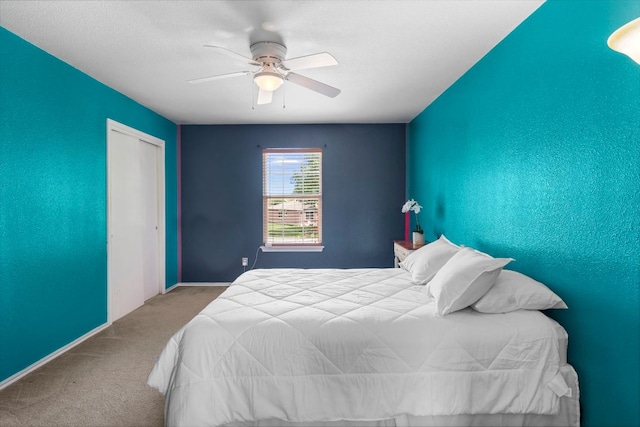 141 Sydneys Way, Buda, TX 78610 - carpeted bedroom featuring ceiling fan and a closet