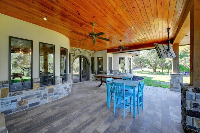 view of patio featuring ceiling fan