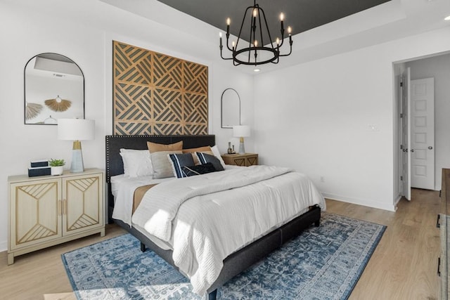 400 Veneta Ln, Georgetown, TX 78633 - bedroom featuring a chandelier, light wood-style floors, and recessed lighting